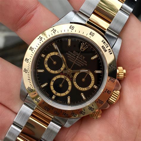 daytona black dial gold|rolex daytona black and white.